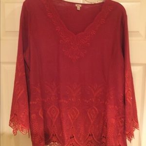 Red pullover top by Reba.